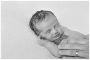 black and white portrait of baby boy from newborn photography session